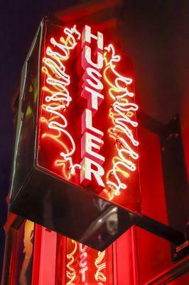 Neon HUSTLER sign always means something sexy, what's your craving?