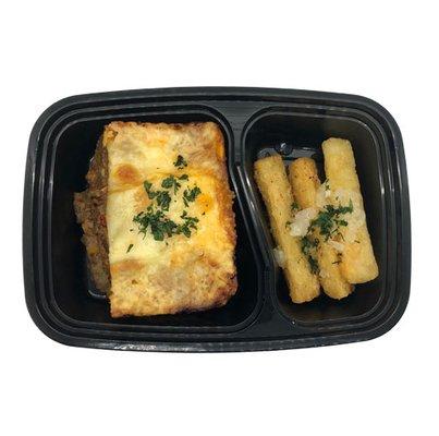 Puerto Rican Pastelon served with Yuca con Mojo