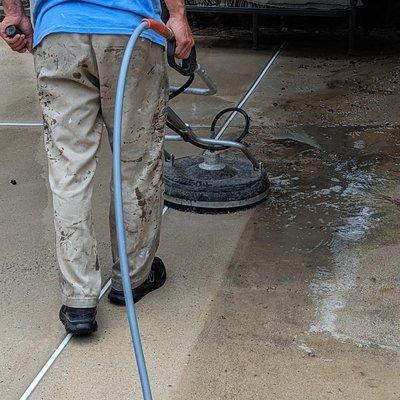 Months of dirt and grime buildup are being cleaned away to create a drastic change in the look of this pool deck.