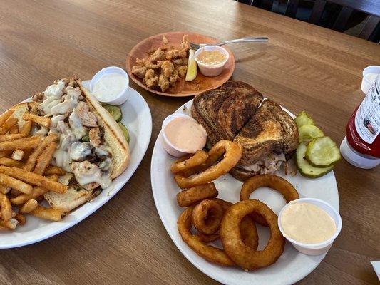 Chicken Philly cheesesteaks, Turkey rueben and Gator Bites