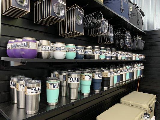 Full Lineup Of Yeti Cups and Coolers On Display.