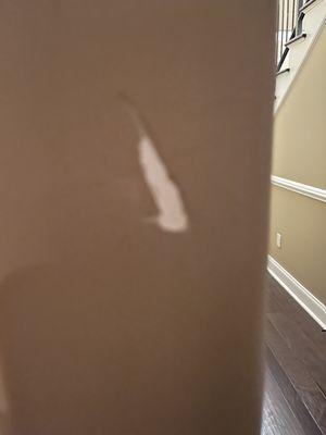 Huge gouge in my wall from ramming furniture into my bedroom.