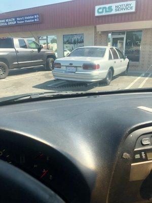 Here's a photo of their car when the guy was in the store