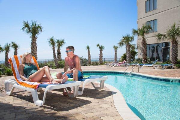 Family by the pool.