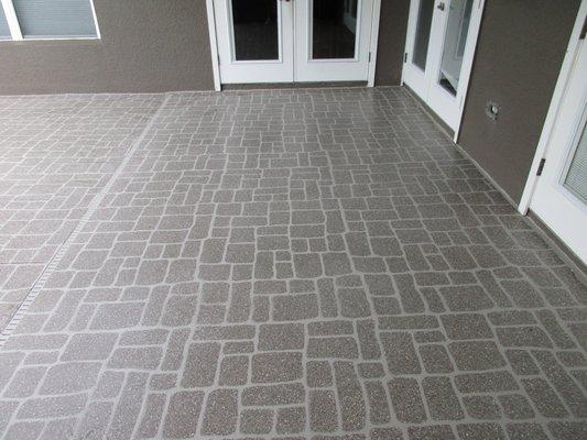 Cobblestone design acrylic sealer patio