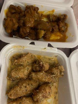 Garlic Parmigiana Wings and A lb of gizzards with sweet and tangy sauce I LOVE this place