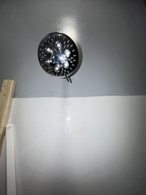 Cut/gouged/uneven wall where person would stare at it each time showered.