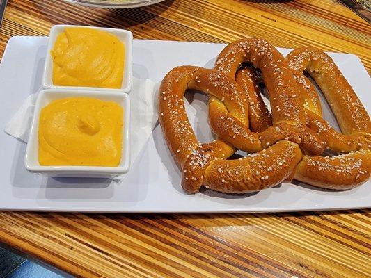 Happy hour Pretzels with beer fondue cheese $4! Can you believe it? 2 pretzels for $4 total! Definitely the softest I've ever had!