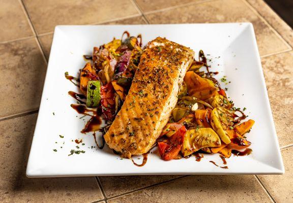 Salmon over house veggies