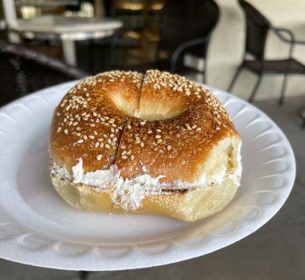 Toasted sesame bagel w/ plain cream cheese ($4.19).