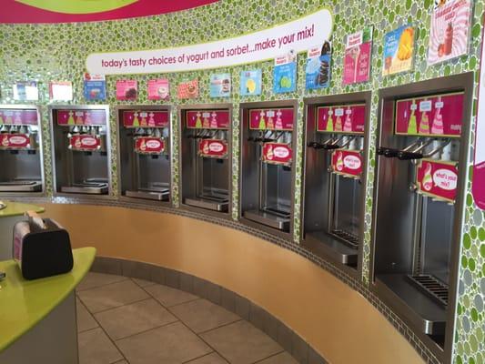 Self serve frozen yogurt wall