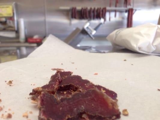 Delicious slivers of beef biltong  - and the smoky goodness of the smoked beef sticks hanging in the background