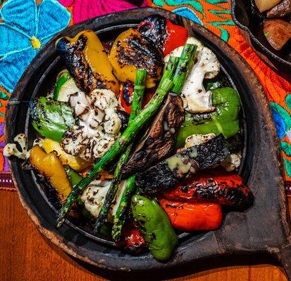 GRILLED VEGETABLE MIXTA v 
charbroiled seasonal vegetables with roasted poblano/cilantro dressing served sizzling