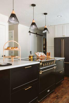 Kitchen Island extension and new cabinets by Stutler Cabinets.