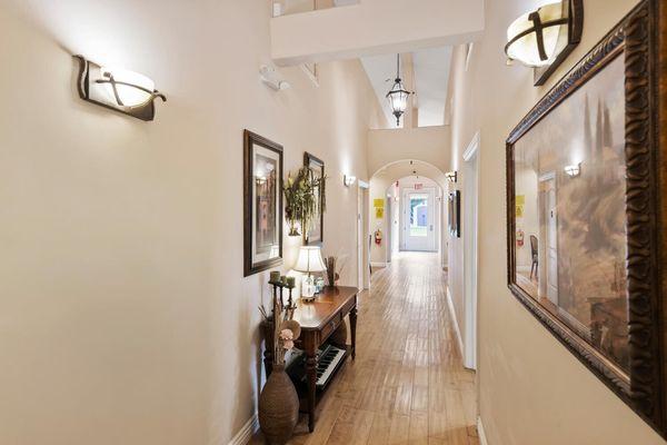 Open hallway leading to resident rooms, more common areas and outdoor spaces