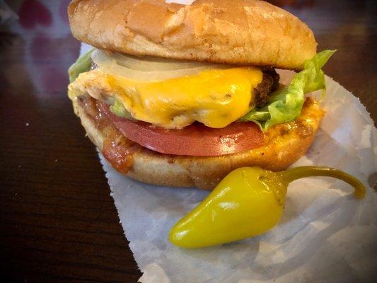 Single cheeseburger no sauce, ketchup/mustard instead, add onion and spicy hot peppers can be added to-go