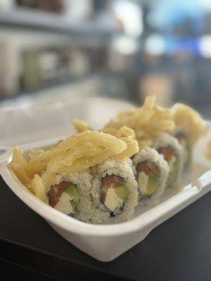 Philadelphia roll with added crispy onions on top