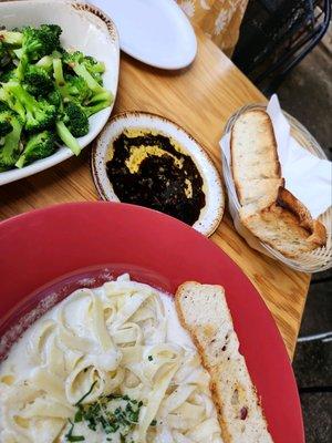 Toasted focaccia with Herb blend, oil and balsamic,  broccoli with toasted garlic and fettuccine alfredo.