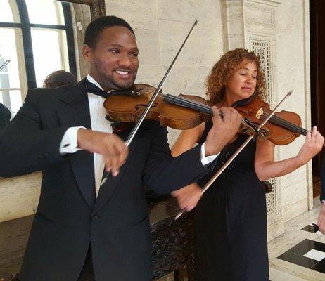 Strolling Violins greet arriving guests.