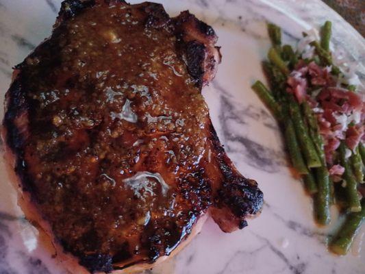 The pork chops are seared to perfection.