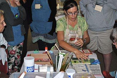 Resident Artist teaches an art program