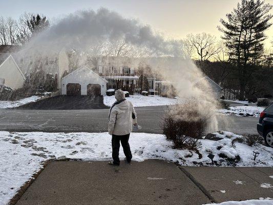 A glass of boiling water at -15.