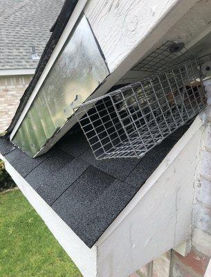 This is a one-way door that is placed over an entry point a squirrel made, this allows the squirrel to exit, and not get back in.