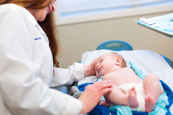 We take care of all ages, and here we are helping a newborn baby