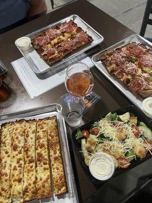 Cheese breadsticks, side salad, deluxe pizza, pepperoni pizza