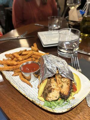 Salmon Pita Wrap with sweet potato fries on the side