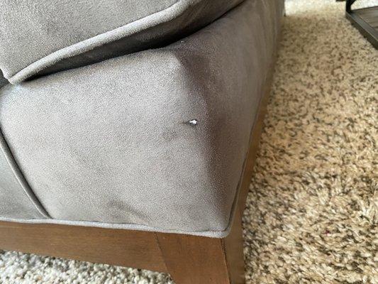 Tear in our less than 2 year old couch.