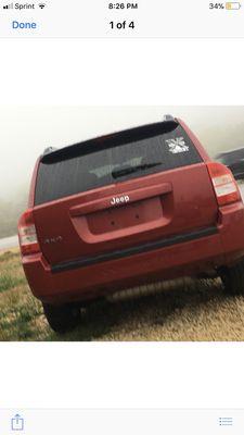 The car on date of purchase, clearly without the large scratch on the back of the vehicle.