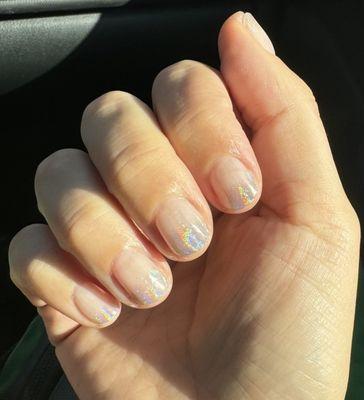 Gel mani with iridescent chrome by Kelly.