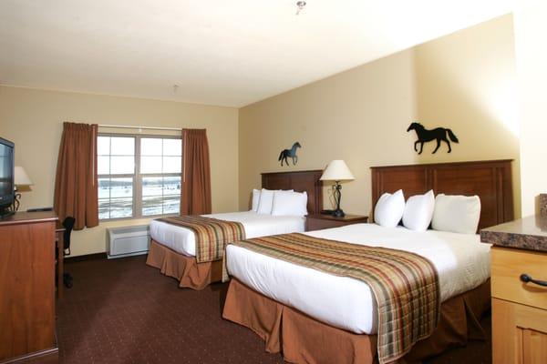 Our beautiful double-queen rooms offer plenty of room for souvenirs and luggage.