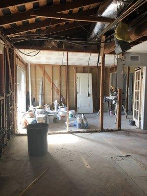 A view from the old kitchen space into the dinning room where we had the new kitchen placed