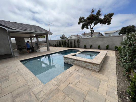 Backyard remodelling Pavers and Patio cover