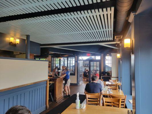 Middle section dining room. You can seat the rear section in the back, through the doors; the best water views are there.