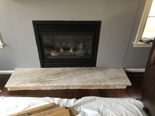 Cracked hearth with my attempted repair