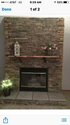 Culture stone fireplace with hearth and mantle