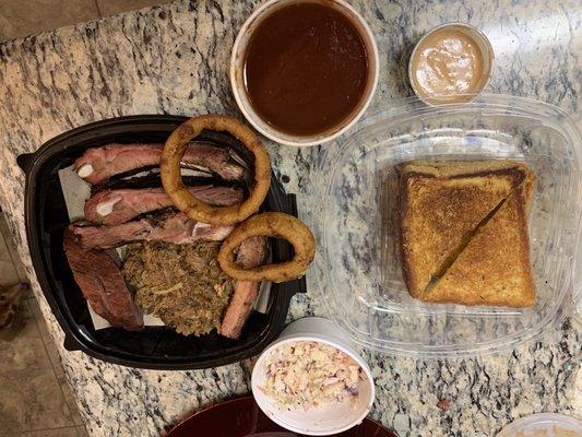 BBQ Dinner  (ribs, tri tip, pulled pork, onion rings, Cole slaw, sauce, bread)