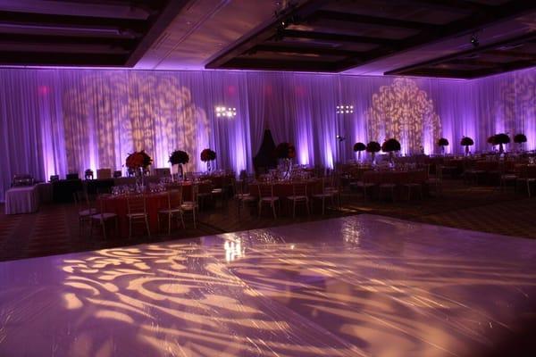 Purple uplights with 3 monograms