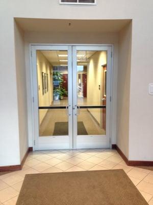 Second set of doors through the main entrance of the JRA Financial building.  Structure Therapy is straight ahead on the right.