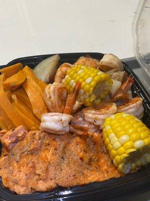 Salmon, shrimp, corn, and sweet potato