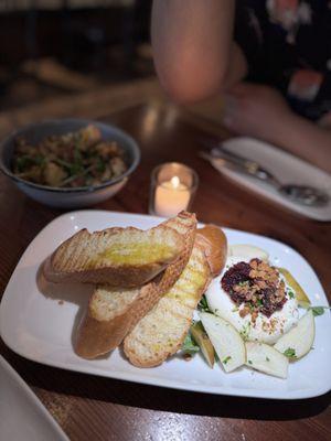 burrata with pear and cranberry and spiced walnuts