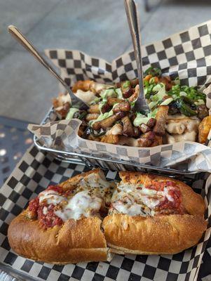 Meatball sandwich and loaded waffle fries.