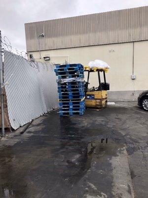 Really organized near the back room and clean with no trash and pallets top of one another. I love how clean this store is.