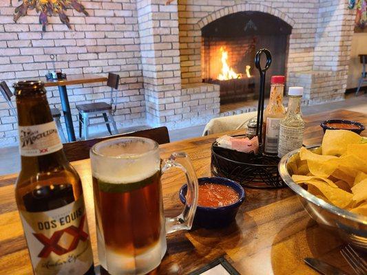 Nice table by fireplace