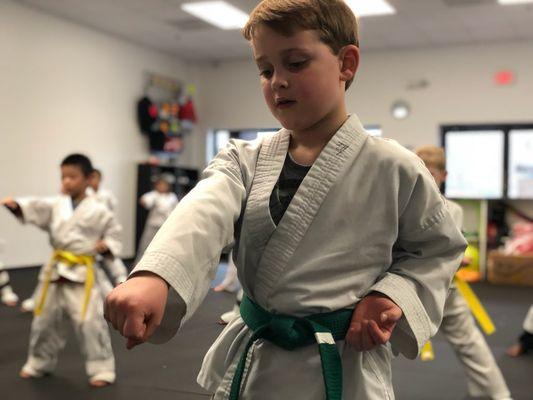 Focusing on aiming in our After School Program's taekwondo class.