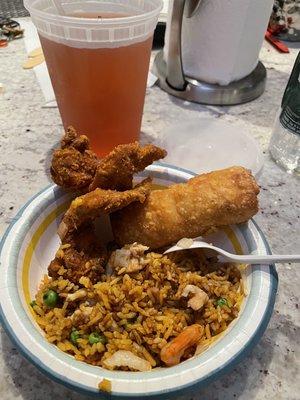 House fried rice, chicken wings, egg roll and sweet tea.