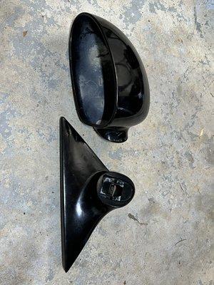 Black side mirror cover assembly before painting